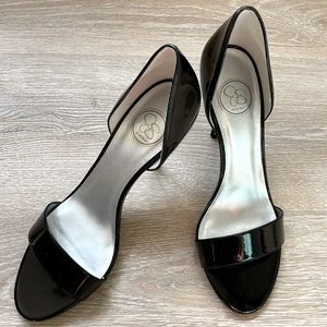 Patten leather pumps